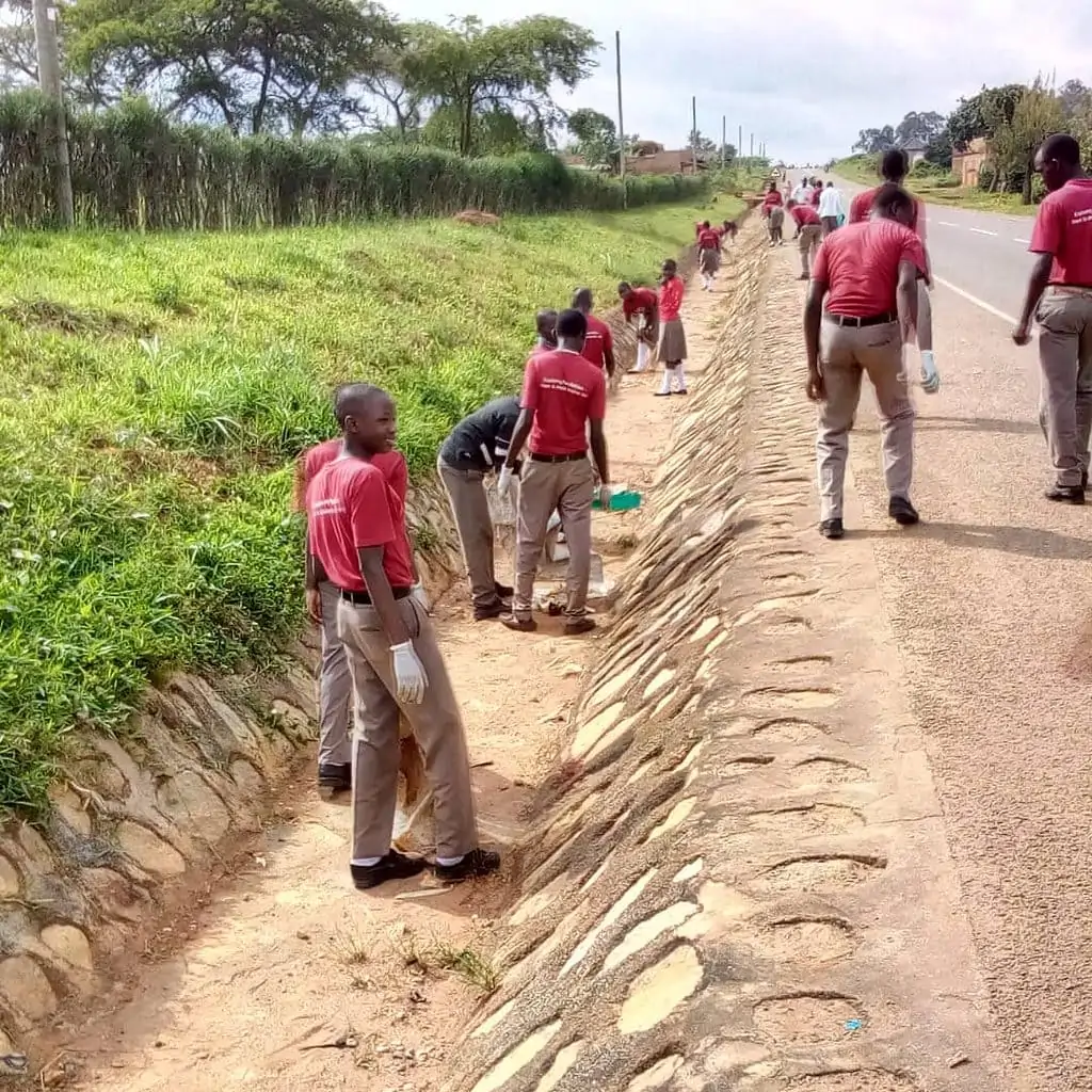 Students picking up plastics